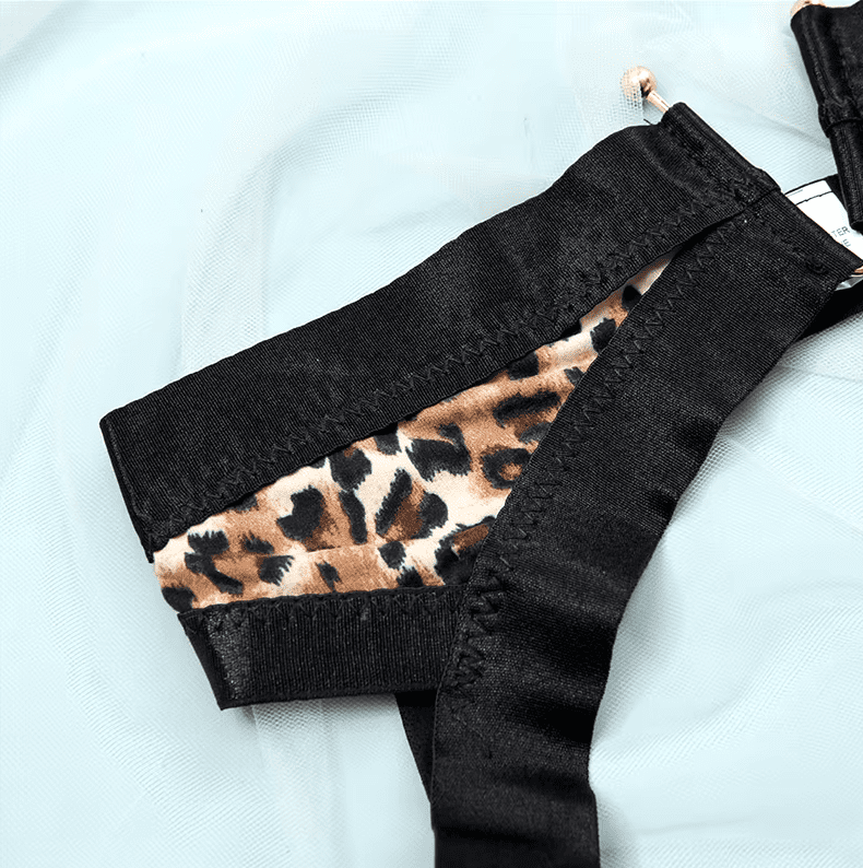 Body de encaje con Portaligas y corset Animal print